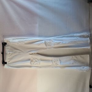 Women white fashion nova flare down distress jeans. Size 1X tall NWT